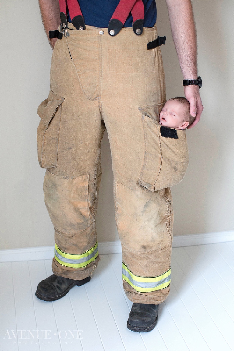 baby in fireman's pants pocket