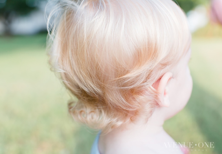 little boy's blonde hair with flip in back