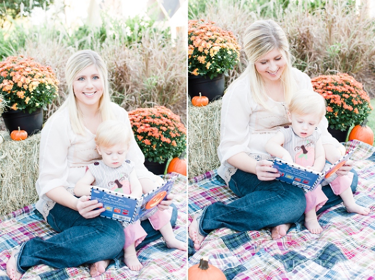 mom and son reading books outside on blanket