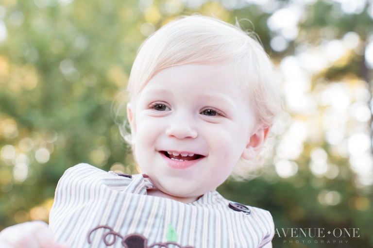 blonde little boy laughing