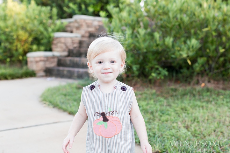 little boy running toward camera