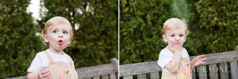 little boy blowing kisses