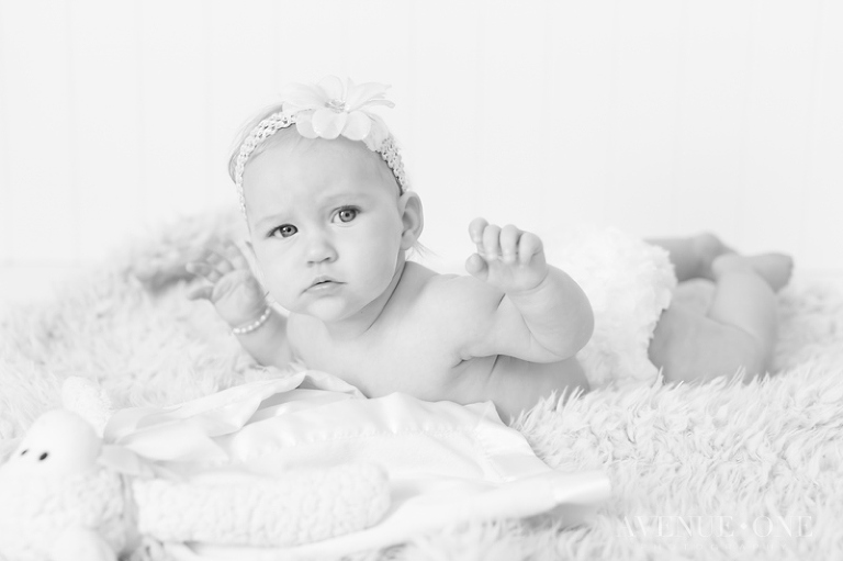 baby girl making silly faces