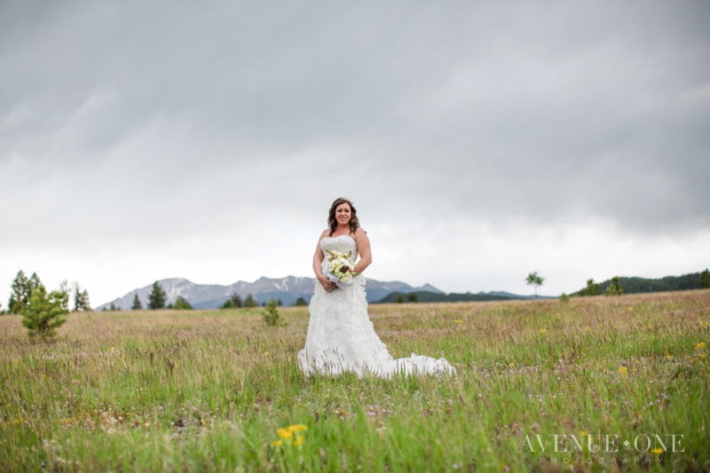bride in wildflower field