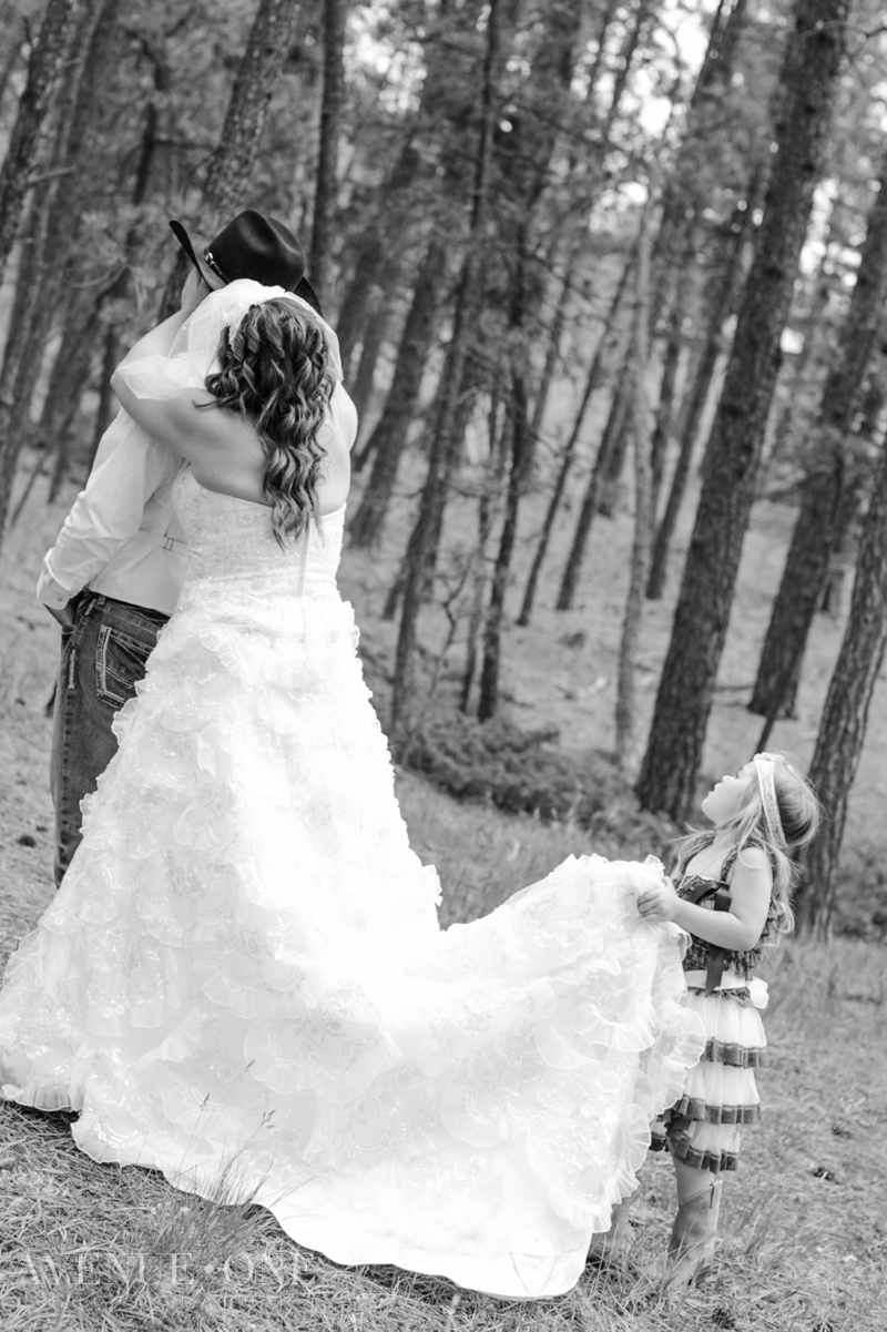 bride and groom first look in forest