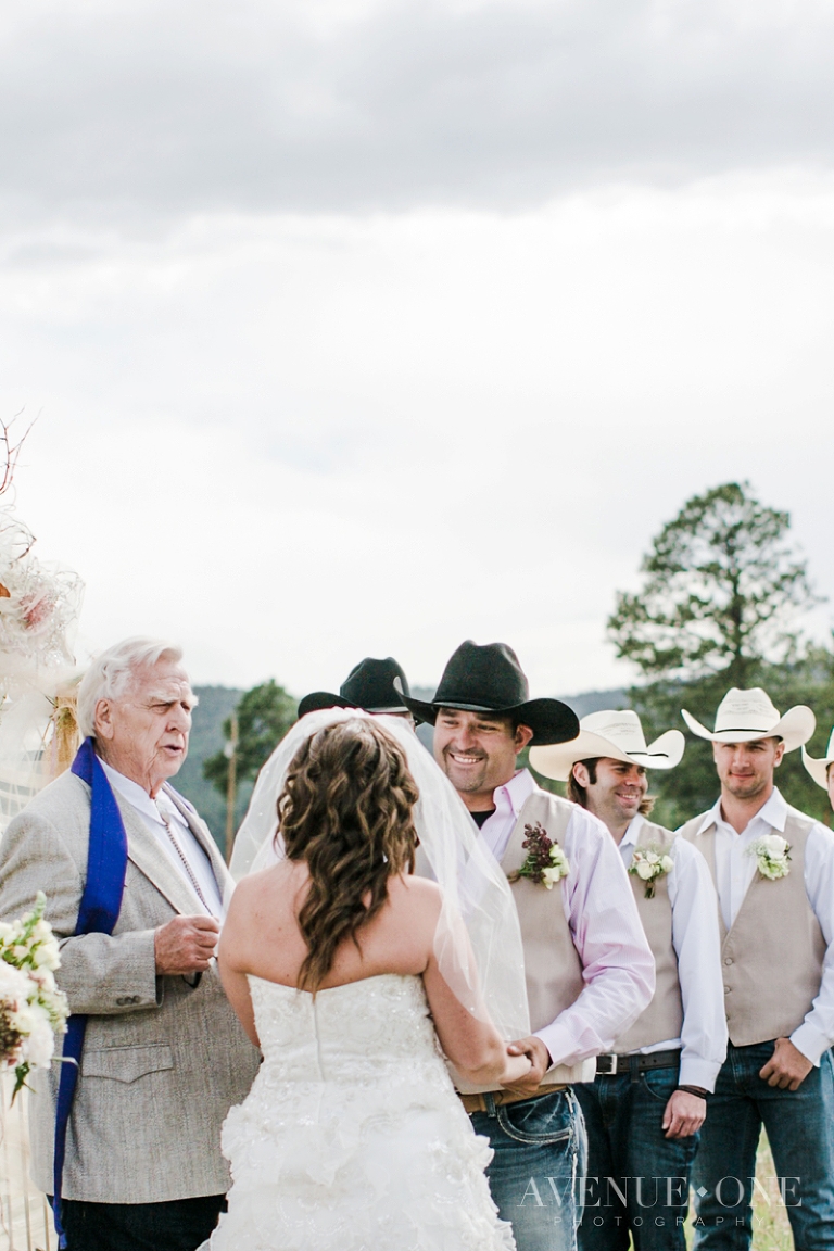 groom looking at bride during ceremony