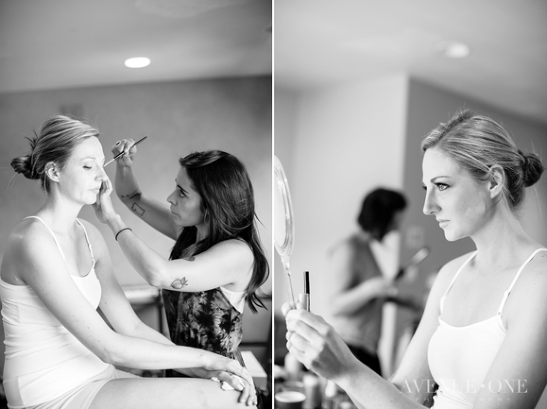 bride getting ready holding mirror