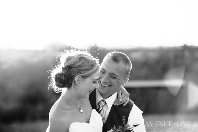 bride and groom laughing