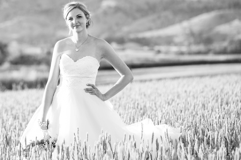 gorgeous bride in field of tall grass