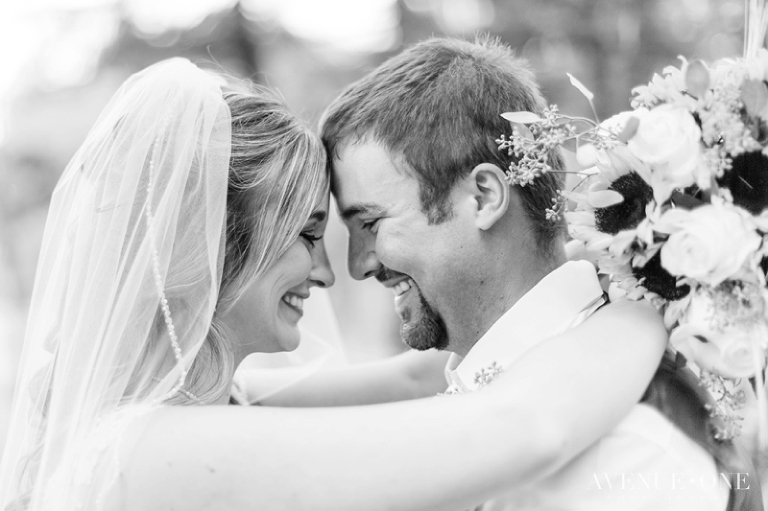 bride and groom touching foreheads
