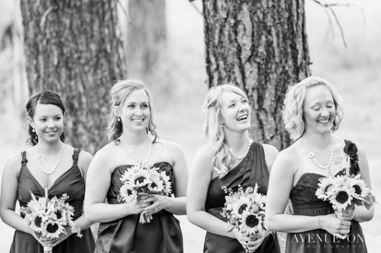 bridesmaids laughing during ceremony