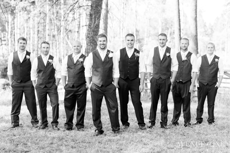 groomsmen picture with groom in front