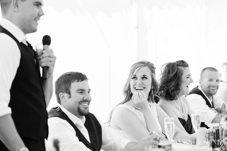 best man speech with bride and groom laughing