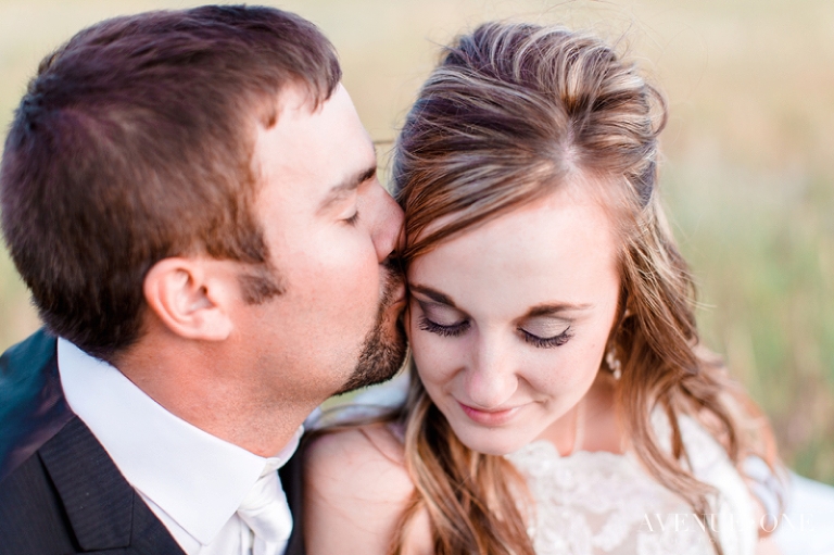 Intimate moment between bride and groom