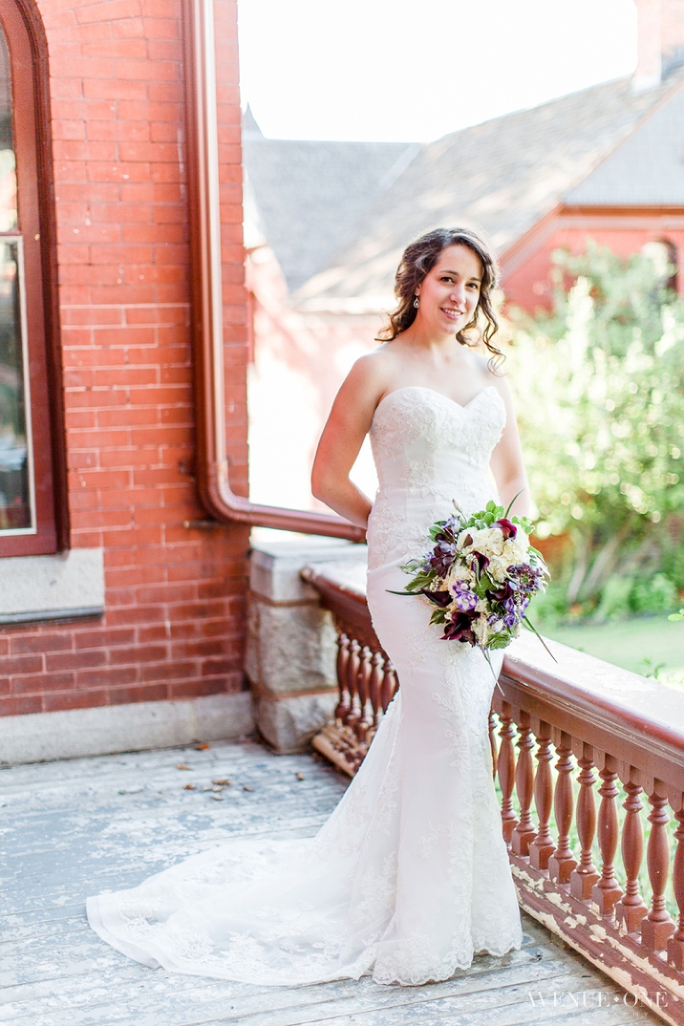 bride standing on balcony