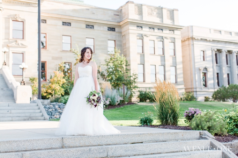 bride in tulle gown on steps