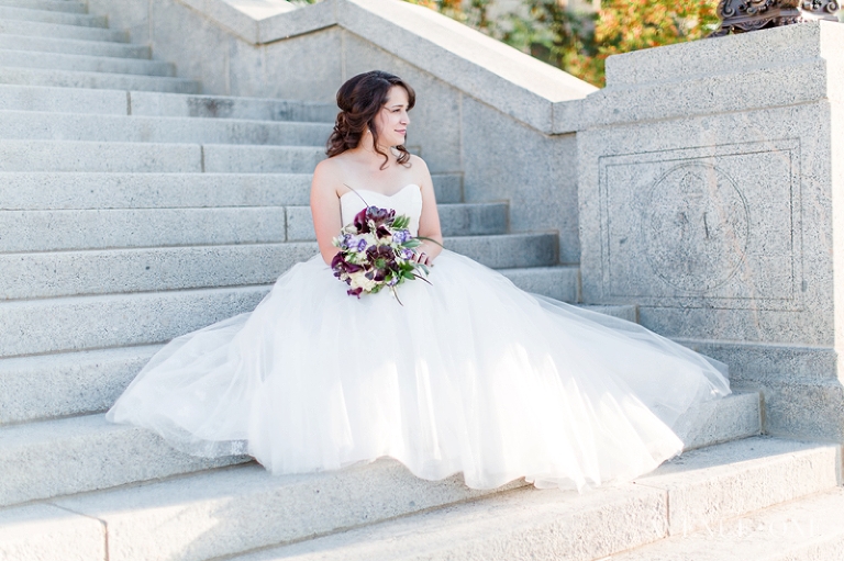 bride looking into the distance on steps