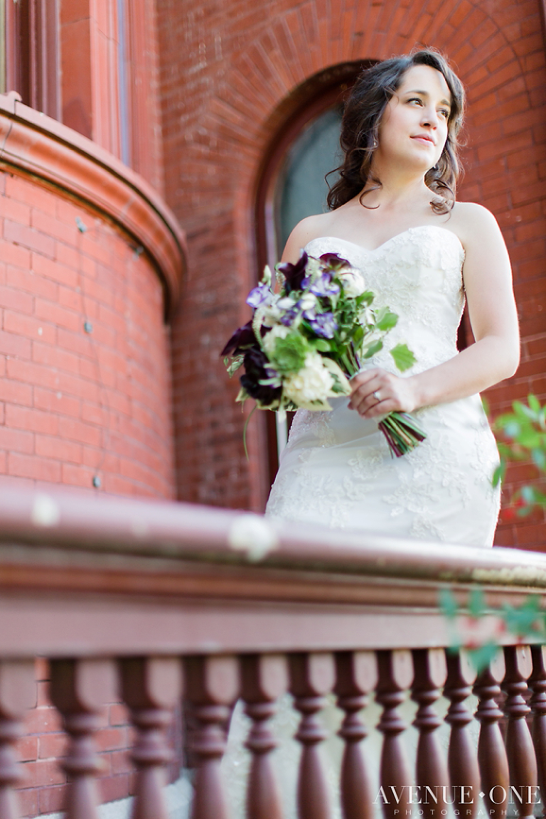 bride standing on balcony