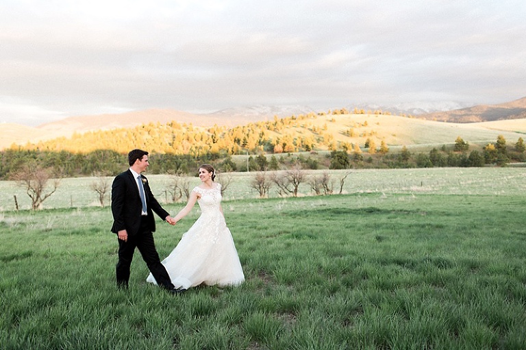 Bride and groom in field in Helena, MT