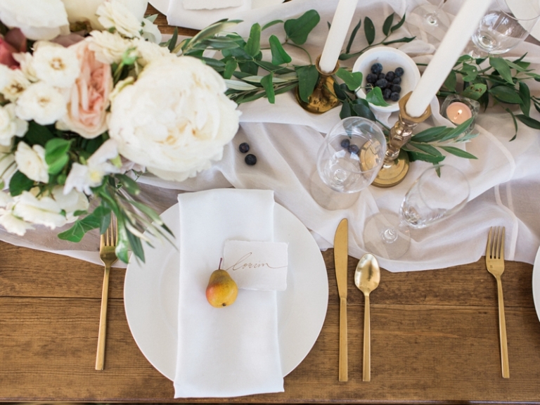 Wooden Wedding Table Set with Blush Flowers and Gold Flatware